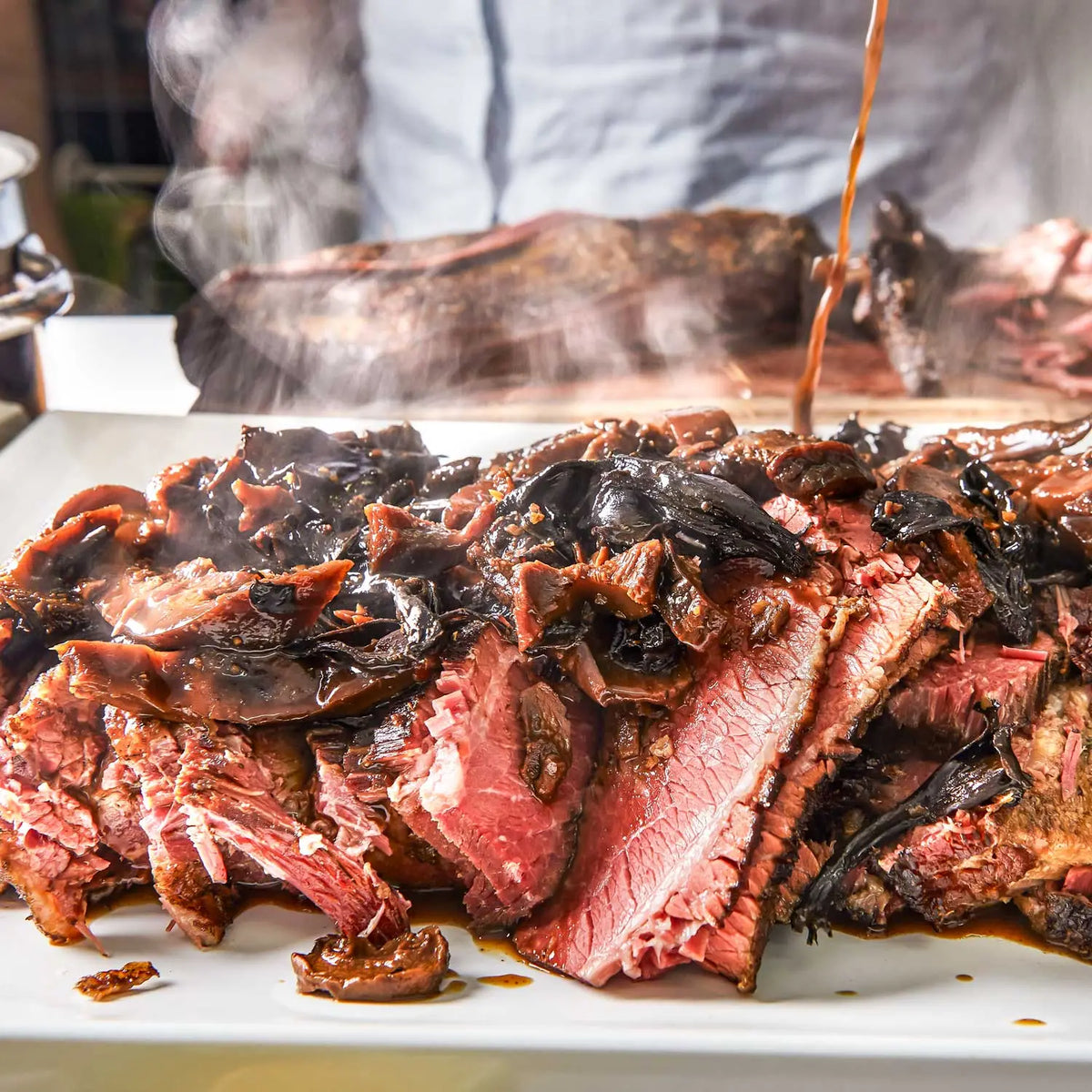 Feast on Our Brisket + Ribs Meal – Perfect for 6-8